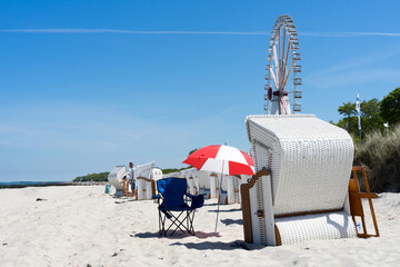 beautiful beach chair in the sand on a sunny, relaxed day on the coast of Mecklenburg Western...