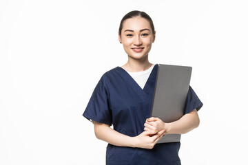 Young Asian female doctor holding laptop computer, with stethoscope on white background