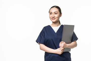 Young Asian female doctor holding laptop computer, with stethoscope on white background
