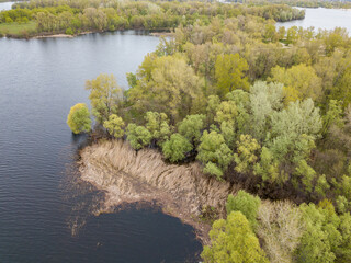Lake shore in spring. Aerial drone view.