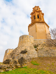 Jérica, Alto Palancia, Valencian Community, Spain. Tower of the Bells (Torre mudéjar de las Campanas) constructed in 1634. Unique religious monument. Low angle and vertical shot.