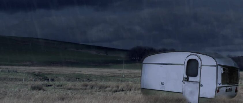 Camper trailer during storm at night, Glasgow, Scotland, UK