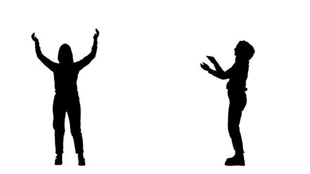 Black silhouette of a young woman in youth stylish clothes and hood dances and claps her hands. 2 in 1 Collage Front and side view full length on white background. Slow motion ready 59.94fps.