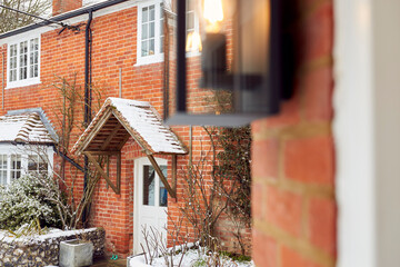 Close Up Of Exterior Porch Outside Snow Covered House In Winter