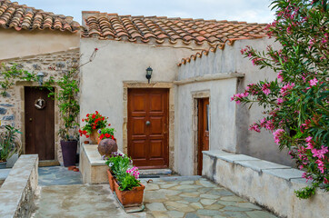 Beautiful Traditional Old Houses with Medieval Architecture and Nice Decoration with Flower Pots