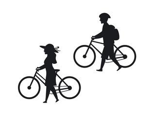 man and woman walking with bicycles silhouettes