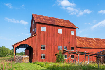 Obraz premium Old wooden barn for industrial peat factory