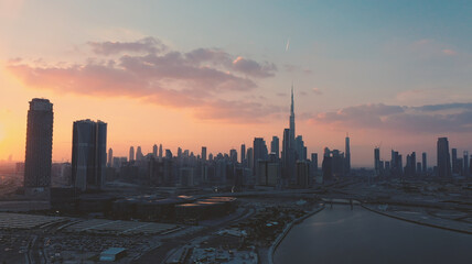 Naklejka na ściany i meble AERIAL. Top view of downtown Dubai at beautiful sunset, United Arab Emirates.