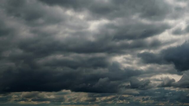 beautiful dark dramatic sky with stormy clouds time lapse before the rain 
