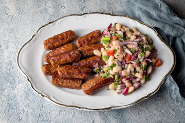 Turkish Tekirdag or inegol Kofte with Piyaz Salad