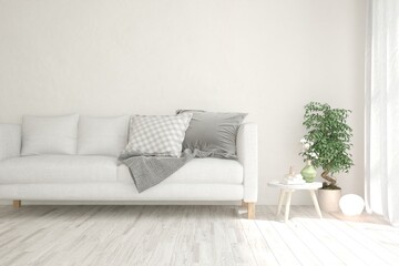 Fototapeta premium White living room with sofa. Scandinavian interior design. 3D illustration