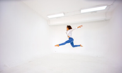 Young woman dancer jumping, Dancer Stretching