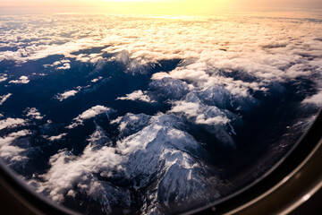 Aerial view of snowy mountains over Washington State , Aerial view from window of airplane in Seattle, Washington State ,USA