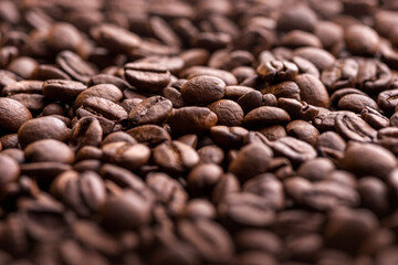 Roasted coffee beans. Background and macro