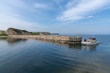 small fishing boat enters the harbor at Ejerslev Lynd