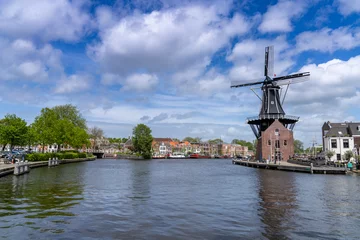 Deurstickers view of the Dee Adrian Windmill and Binnen Spaarne River in Haarlem © makasana photo