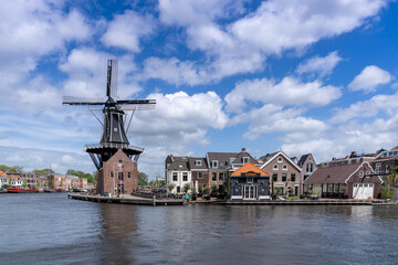 Fototapeta na wymiar view of the Dee Adrian Windmill and Binnen Spaarne River in Haarlem