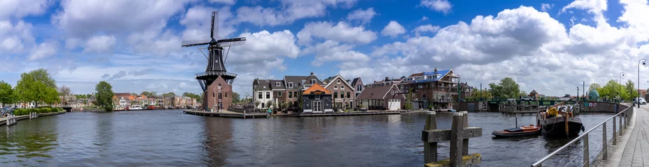 Foto op Plexiglas panorama view of the Dee Adrian Windmill and Binnen Spaarne River in Haarlem © makasana photo