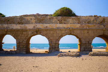 Fototapeta na wymiar Beautiful view of ancient Roman Aqueduct in Caesarea, Israel