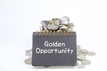 coins and notebooks written Golden Opportunity