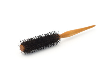 Hair brush with hair loss isolated on white background.
