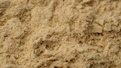 ground ginger close up, top view