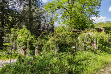 Le Moulin Jaune (Yellow Mill) located on Grand Morin (Gran Morane) banks. Moulin Jaune - 4 ha gardens which conceals multiple works of art. Crecy la Chapelle, France. 