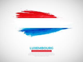 Grunge style brush painted Luxembourg country flag illustration with national day typography
