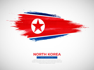 Grunge style brush painted North Korea country flag illustration with national day typography