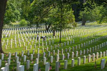 Small American flags mark every grave during   Memorial Day weekend  at Arlington National Cemetery, Arlington, VA.