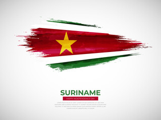 Grunge style brush painted Suriname country flag illustration with Independence day typography
