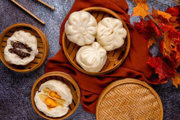 Baozi or Bakpao is a type of yeast-leavened filled bun in various Chinese cuisines. There are many variations in fillings (meat or vegetarian) and preparations, though the buns are most often steamed.