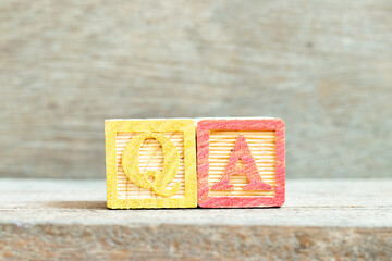 Color alphabet letter block in word QA (abbreviation of quality assurance or question and answer)...