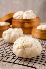 Baozi or Bakpao is a type of yeast-leavened filled bun in various Chinese cuisines. There are many variations in fillings (meat or vegetarian) and preparations, though the buns are most often steamed.