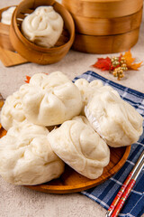 Baozi or Bakpao is a type of yeast-leavened filled bun in various Chinese cuisines. There are many variations in fillings (meat or vegetarian) and preparations, though the buns are most often steamed.