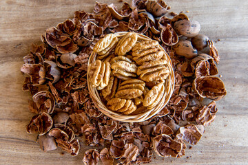 Pecan nut shells background. Top view.