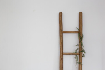 Wooden ladder in an empty loft style room.