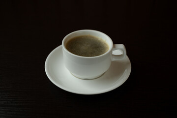 white coffee mug on black background