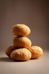 Close-up of freshly baked spicy Dry kachori or crunchy balls filled with spicy dry chutney traditionally authentic Rajisthani and Gujrati.