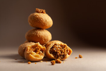 Close-up of freshly baked spicy Dry kachori or crunchy balls filled with spicy dry chutney traditionally authentic Rajisthani and Gujrati.
