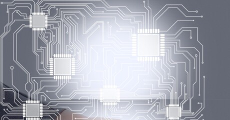 Composition of computer circuit board over handshake and cityscape