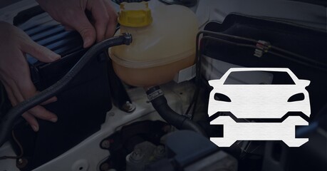 Fototapeta premium Composition of tool and car icon over car engine and mechanic fixing car