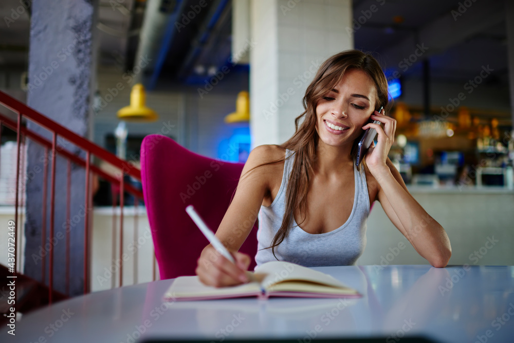 Poster happy young woman calling via smartphone application using mobile connection for discussing educatio
