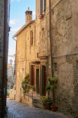 Fototapeta na wymiar old house in italy city street