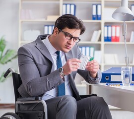 Disabled businessman working in the office