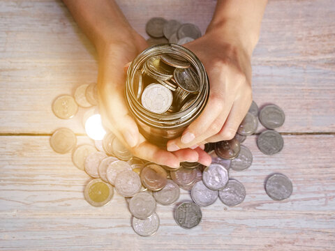 Adult Holding Money Jar, Donation, Saving, Charity, Family Finance Plan Concept, Superannuation Concept.