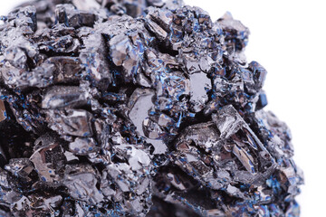 Macro mineral stone covellite on white background