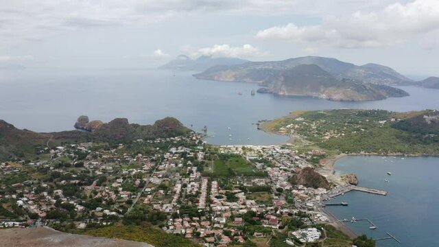 Aerial pan view of Aeolian Islands from Volcano crater, Sicily in Italy, beautiful travel destination.