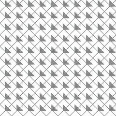 Creative composition with the image of gray geometric shapes on a white background. Seamless background, abstraction. Material for printing on paper or fabric.