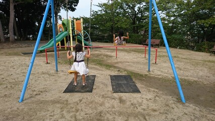 child on swing